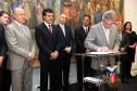Governador Beto Richa, recebe coletânea de cadernos orientadores para a contratação de obras e serviços de engenharia, assina protocolo de intenções entre a Secretaria de Estado da Infraestrutura e Logística e IPARDES - Instituto Paranaense de Desenvolvimento Econômico e Social, termo contratual entre a Secretaria de Estado da Infraesetrutura e Logística e TECPAR - Instituto de Tecnologia do Paraná, anúncia o pagamento do primeiro lote de precatórios de pequeno valor, entrega ao Tribunal de