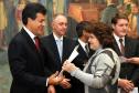 Governador Beto Richa, recebe coletânea de cadernos orientadores para a contratação de obras e serviços de engenharia, assina protocolo de intenções entre a Secretaria de Estado da Infraestrutura e Logística e IPARDES - Instituto Paranaense de Desenvolvimento Econômico e Social, termo contratual entre a Secretaria de Estado da Infraesetrutura e Logística e TECPAR - Instituto de Tecnologia do Paraná, anúncia o pagamento do primeiro lote de precatórios de pequeno valor, entrega ao Tribunal de